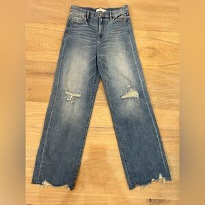 High-Rise Distressed Wide-Leg Jeans in Faded Blue